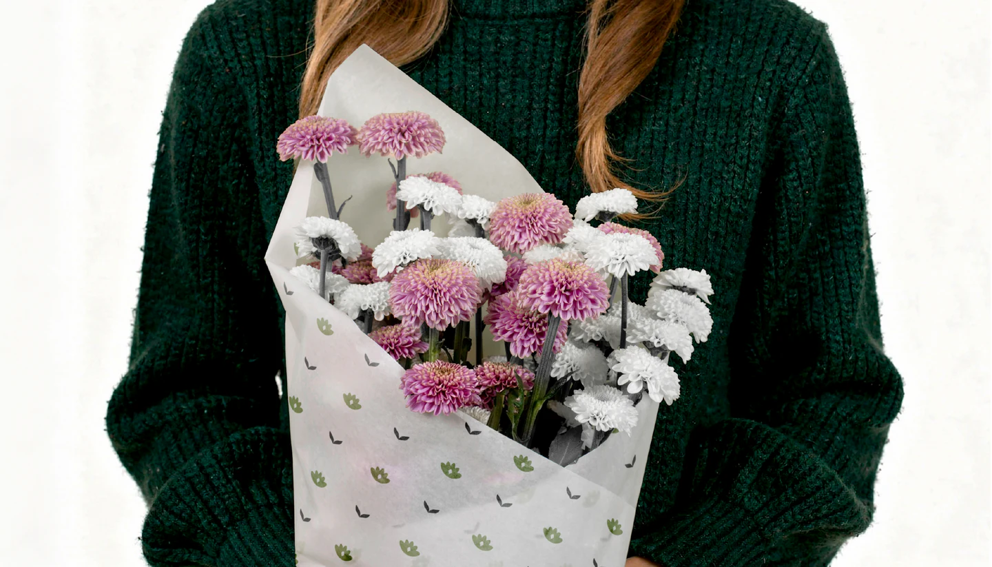 A bouquet wrapped in patterned paper