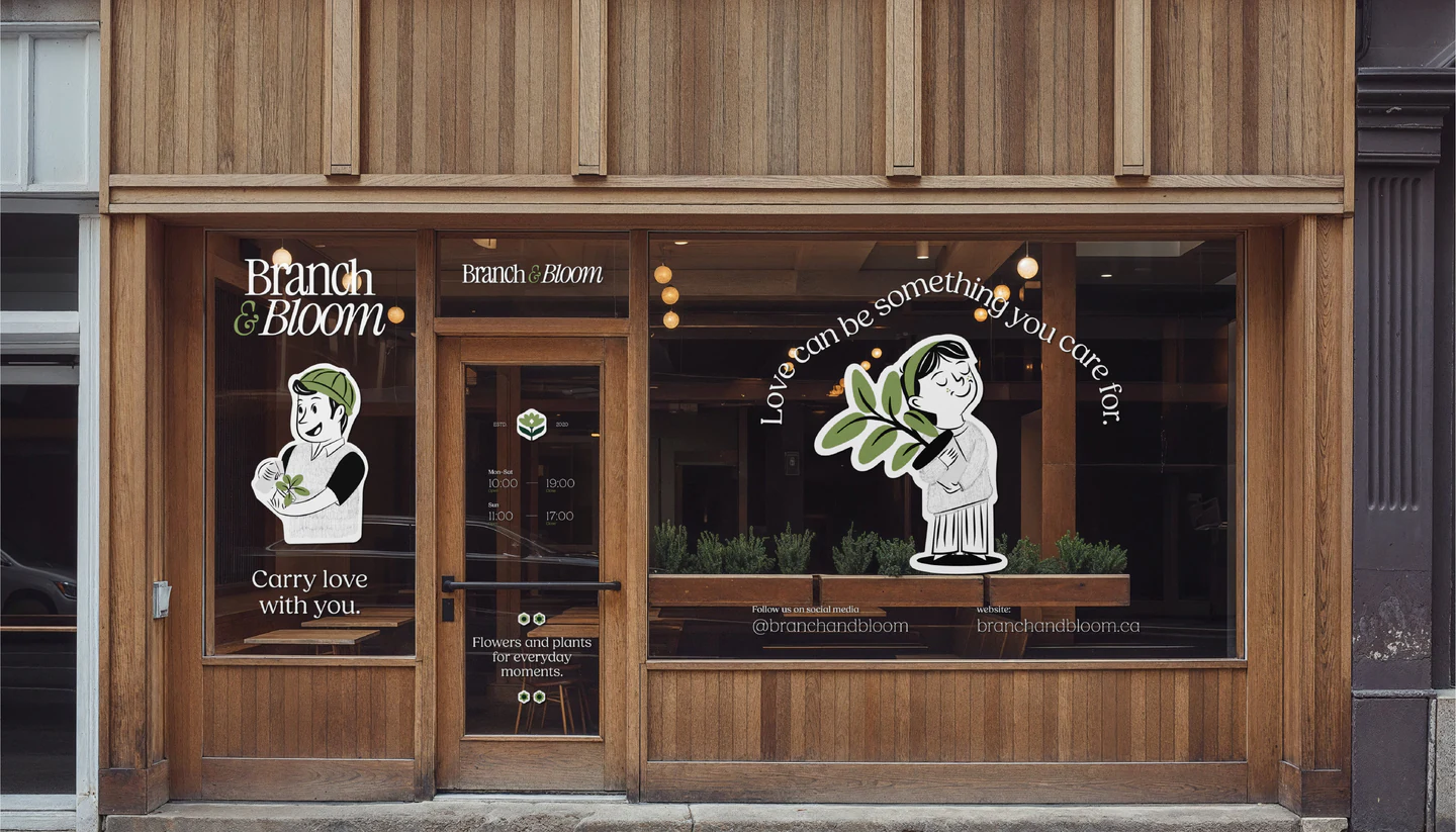 The Branch & Bloom storefront with illustrated window graphics