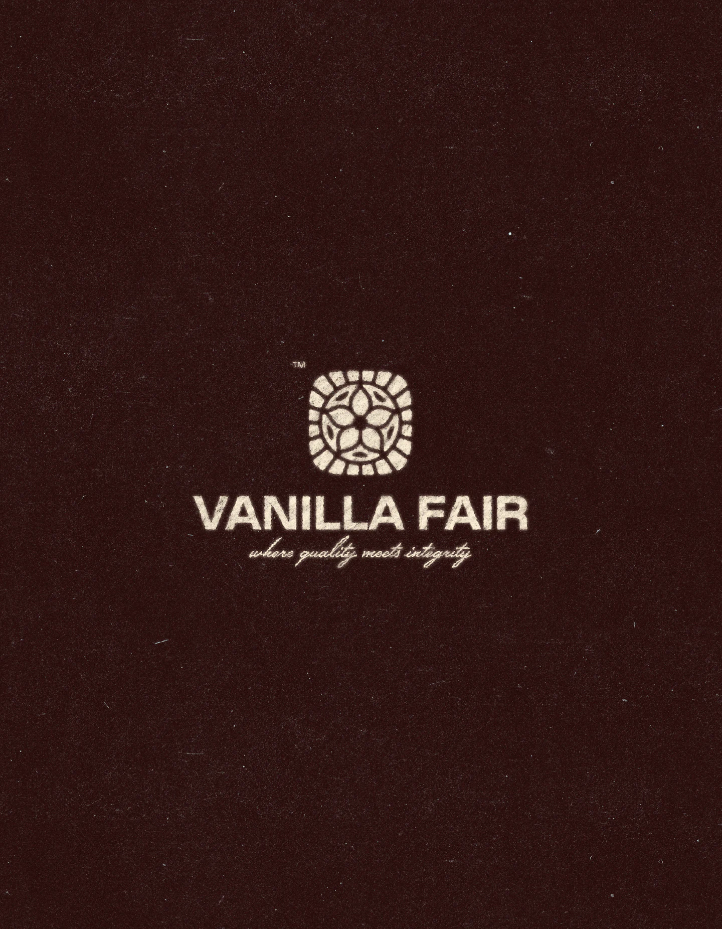 The Vanilla Fair emblem and tagline on maroon