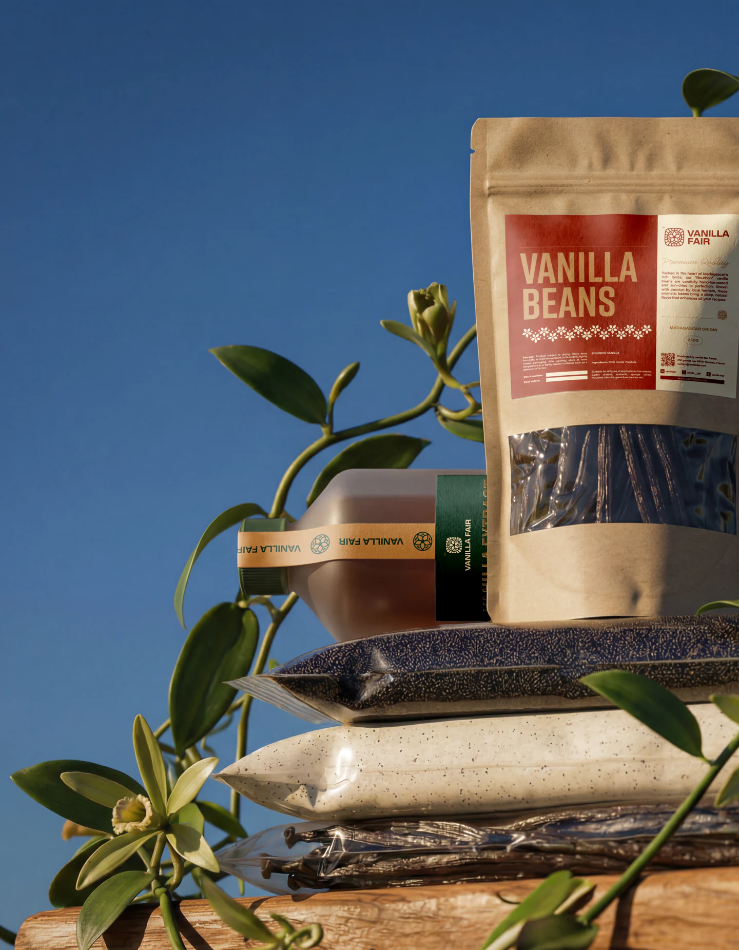The vanilla beans pouch against a blue sky